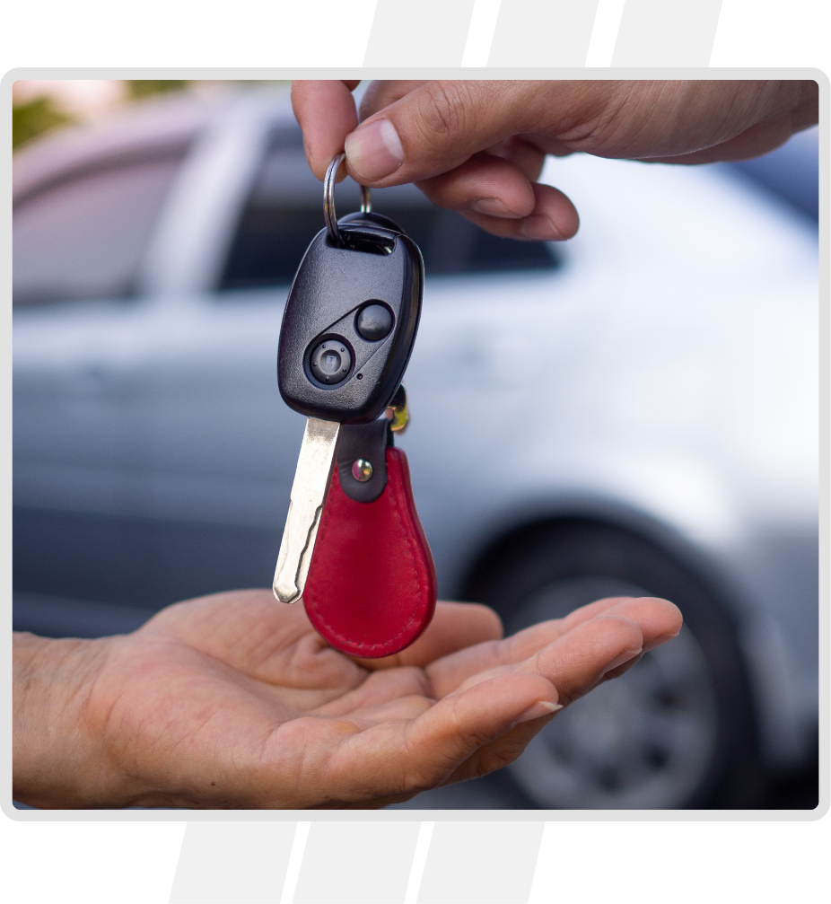 BDE A person holding out their car keys to someone else.